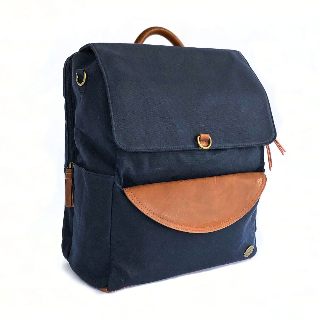 Waxed canvas backpack / rucksack with folded top and waxed canvas